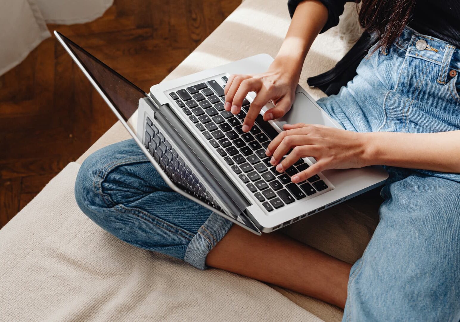 woman typing on computer