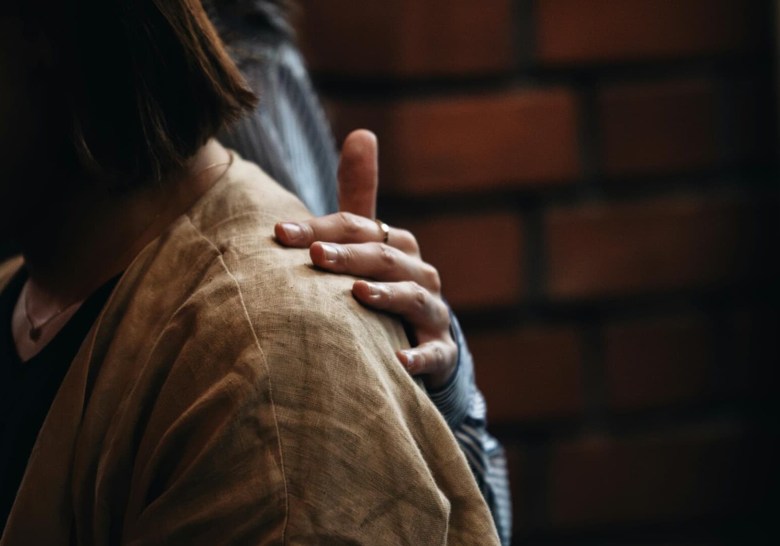 Young woman being comforted