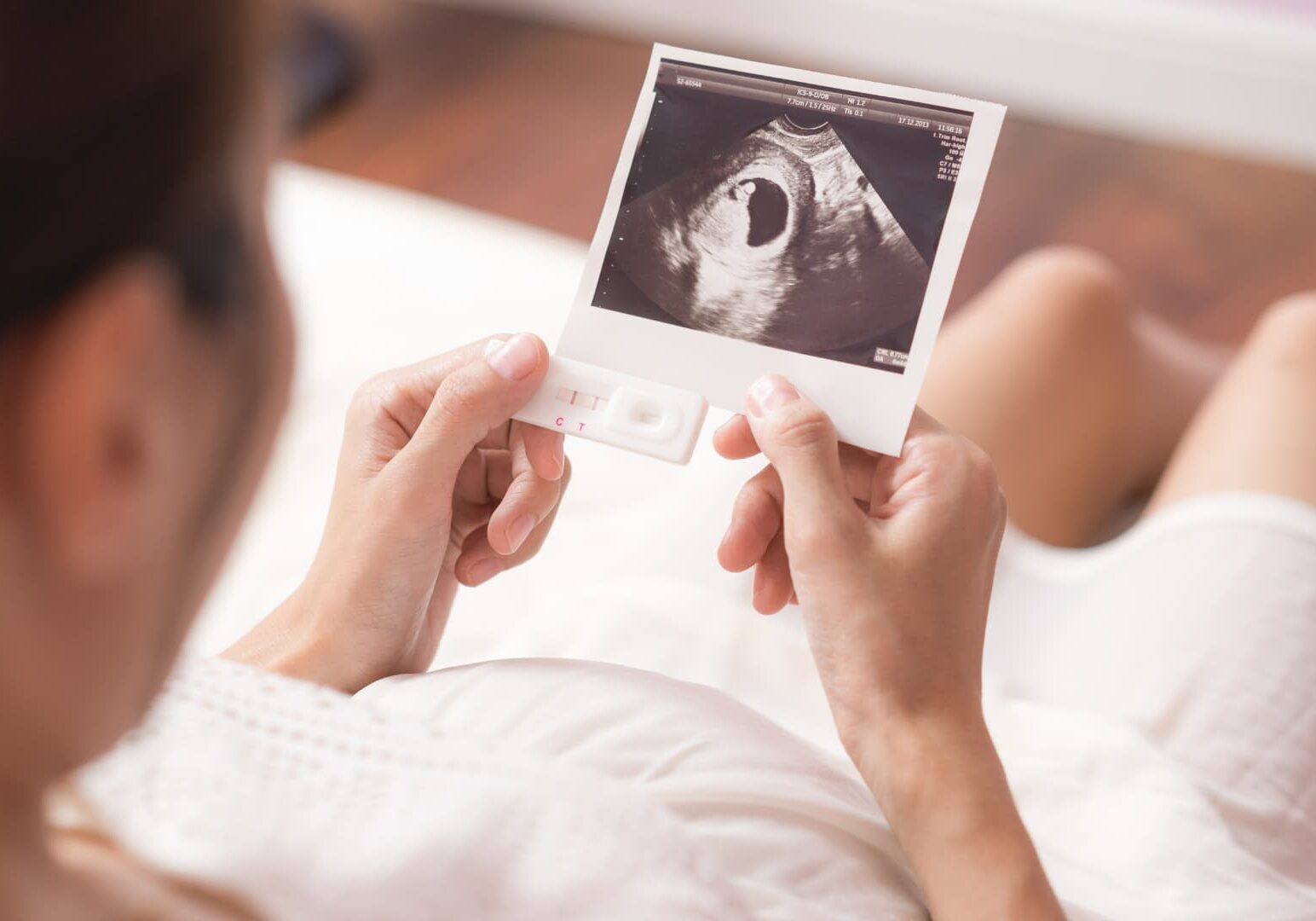 woman looking at ultrasound